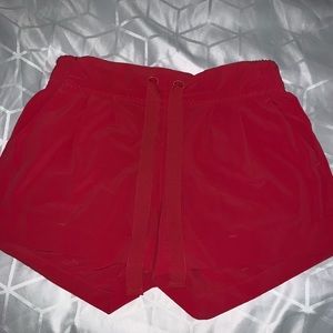 red/pink lululemon shorts